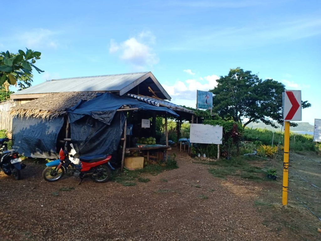 There is a small house with a red motor at the outside. This the Hapitanan only with our Siquijor Island Tour Package.